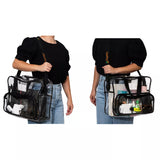 Person holding a clear campaq work bag filled with laptop and business items