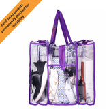 Purple clear CamPaq camping bag side view containing various items on a white background