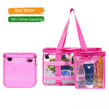 Hot pink clear CamPaq toiletry bag with clear compartments and detachable opaque pocket, containing toiletries, on a white background.
