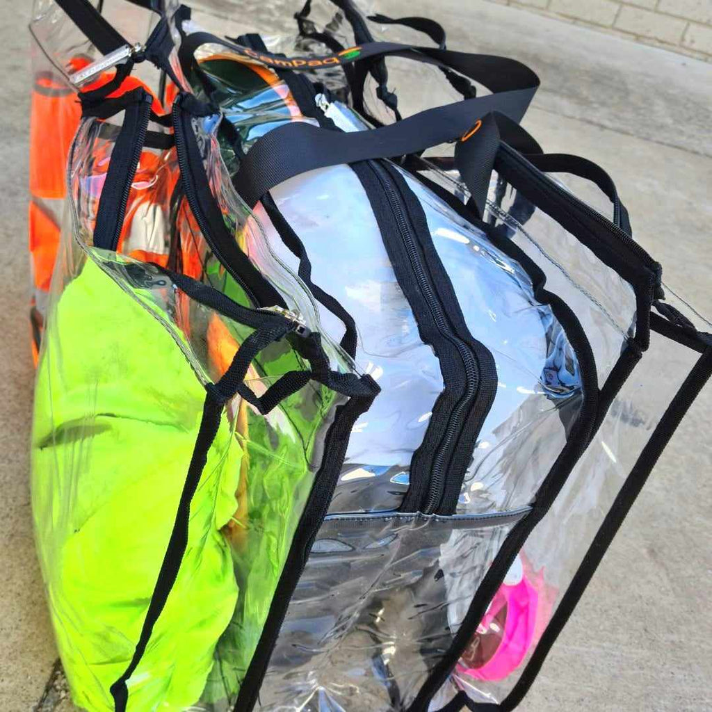 Large campaq bag filled with hard hat and hi viz engineer work clothes