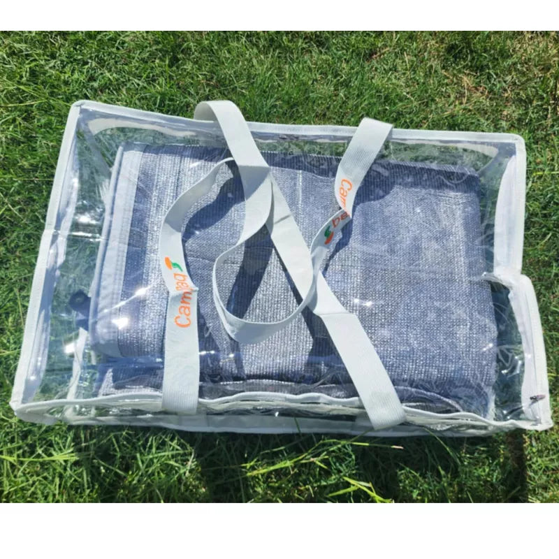 Grey clear under bed storage bag packed with caravan side awning