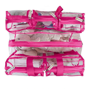 Top view of medium hot pink clear camping bag filled with baby items and zips and handles