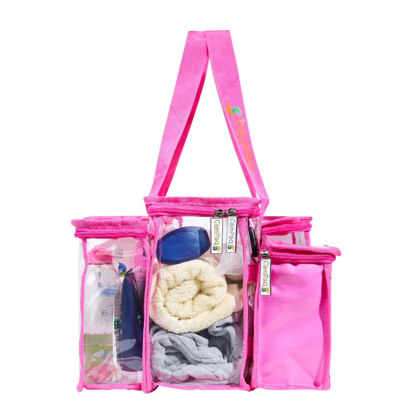 Clear hot pink CamPaq toiletry bag side view showing long handles, clear pockets filled with towel and toiletry items and one opaque detachable pocket.