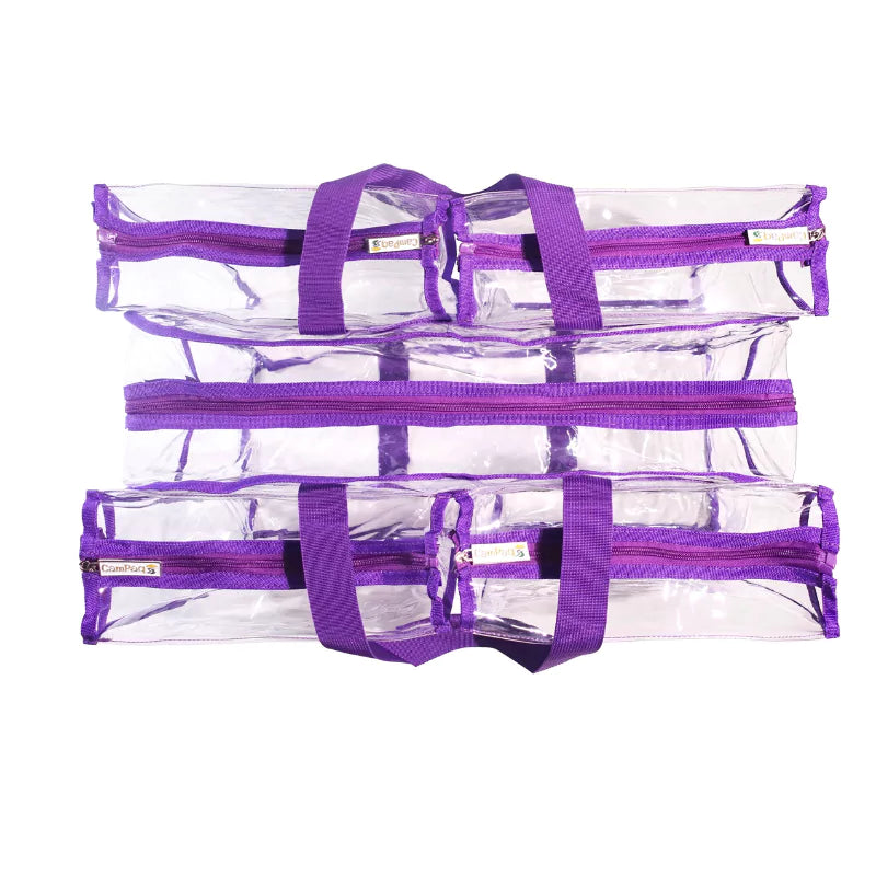 Top view of large purple trim clear CamPaq camping bag showing 5 large pockets with purple zippers