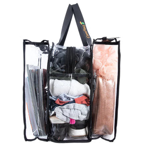 Large black trim clear camping bag filled with clothes and camping gear
